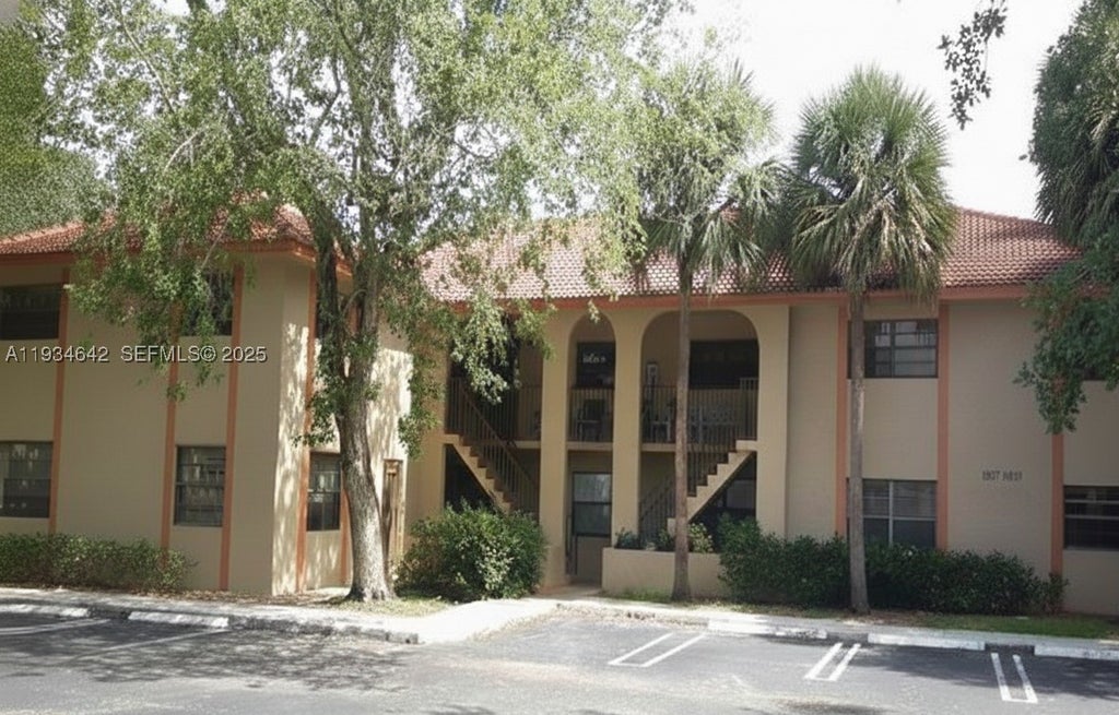 Photo of 11575 Royal Palm Blvd #11575, Coral Springs, FL 33065 (MLS # A11934642)