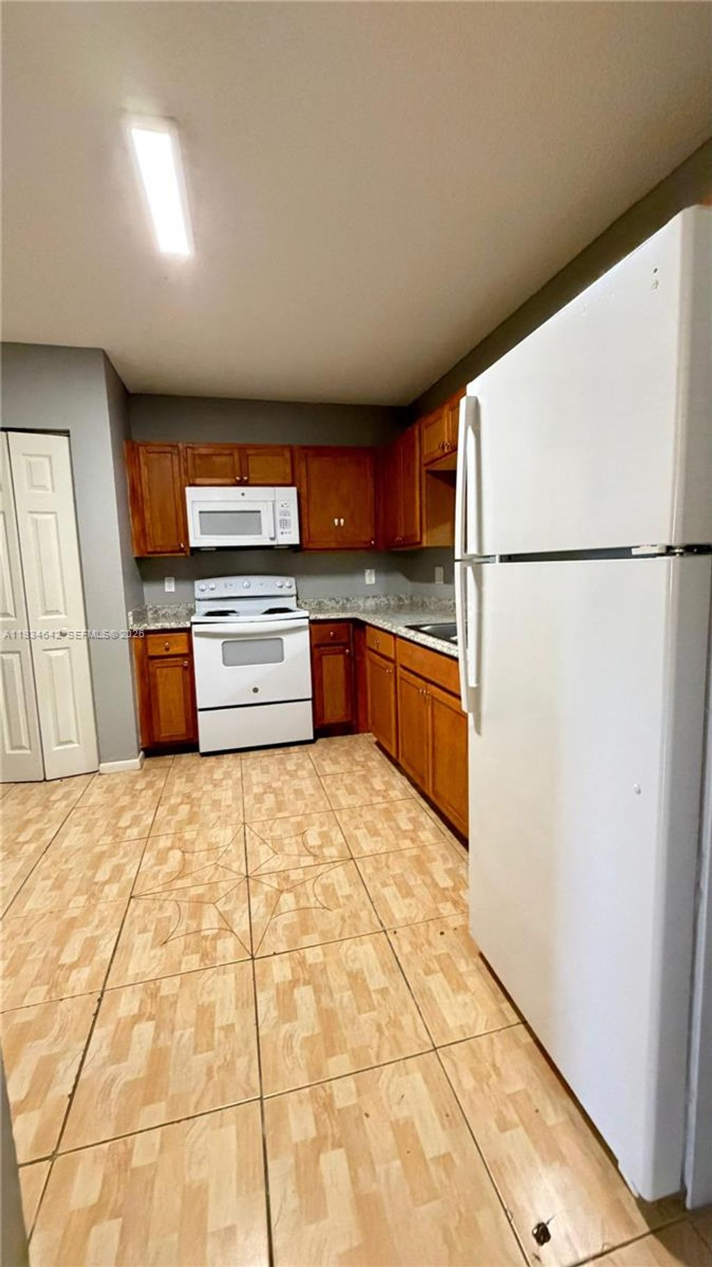 Photo of 11575 Royal Palm Blvd #11575, Coral Springs, FL 33065 (MLS # A11934642)
