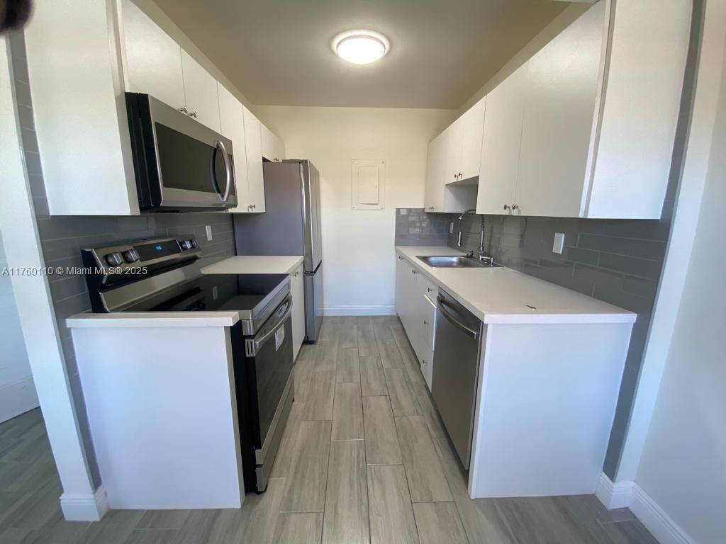 Photo of 1331 S Dixie Hwy #323, Deerfield Beach, FL 33441 (MLS # A11760110)