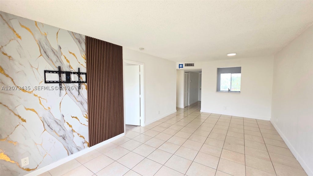 Photo of 8620 N Sherman Cir #306, Miramar, FL 33025 (MLS # A12073435)