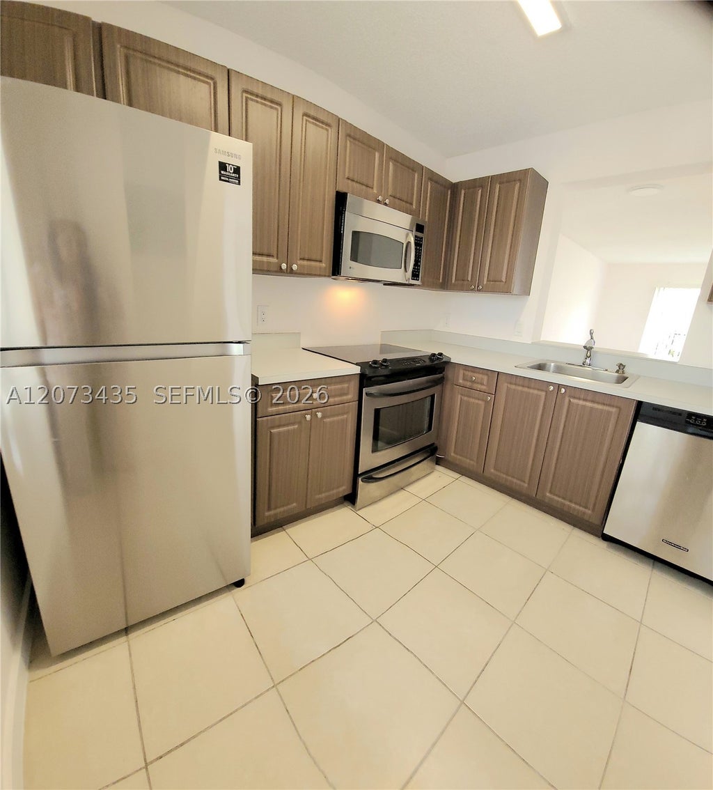 Photo of 8620 N Sherman Cir #306, Miramar, FL 33025 (MLS # A12073435)