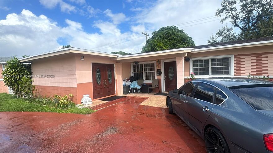 Welcome to this beautifully maintained single-family residence in the heart of Miami Gardens. This home offers the perfect blend of classic charm and modern updates, set in a desirable, well-established neighborhood. A tree-lined street leads to an attractive front entrance. Mature landscaping frames the home with lush greenery. The open floor plan allows natural light to flow from the formal living room through to the dining area and family spaces. Delight in your private yard, ideal for gatherings and relaxing under the Florida sun. There’s ample room for landscaping, play, or creating a custom outdoor oasis.