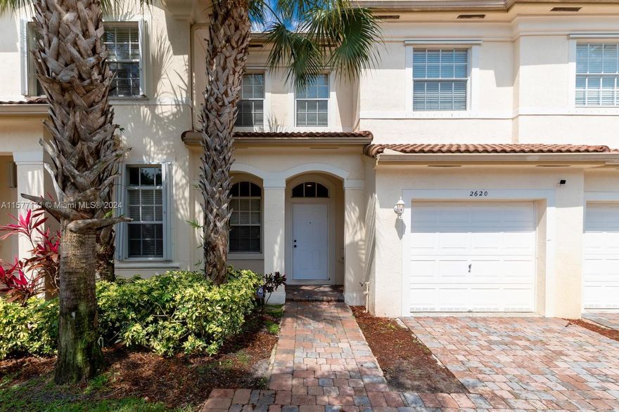 DESIRABLE TOWNHOUSE WITH 3 BEDROOMS, 2.5 BATHS AND GARAGE. BEAUTIFUL KITCHEN WITH GRANITE COUNTER TOPS AND UPGRADED CABINETS.  TILE FLOORS DOWNSTAIRS, WOOD FLOORS  UPSTAIRS, SPACIOUS MASTER BEDROOM, WASHER/DRYER IN UNIT, CLOSE TO CLUBHOUSE, GATED COMMUNITY W/ TENNIS COURTS, FITNESS CENTER AND POOL, MINUTES AWAY FROM TOWNCENTER, EASY ACCESS TO MAJOR ROADS AND HIGHWAYS.