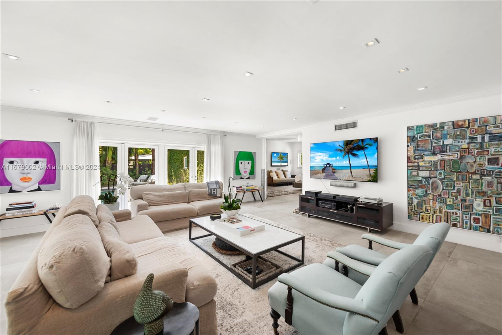 This rare 5-bedroom, 5.5-bath home in the private gated community of Bay Point sits on a nearly 16,000 sq. ft. corner lot, offering ultimate privacy with only one neighbor to the south. Bay Point is one of the only private gated communities in Miami, providing unmatched exclusivity. The impeccable kitchen is a chef’s dream, while the hidden library/office offers a quiet retreat. The master suite boasts his-and-her bathrooms, a luxurious rain shower, and jets for a spa-like experience. Outside, a private oasis awaits with a pool, hot tub, and outdoor kitchen. This is a rare opportunity for refined living in Miami’s best-kept secret.