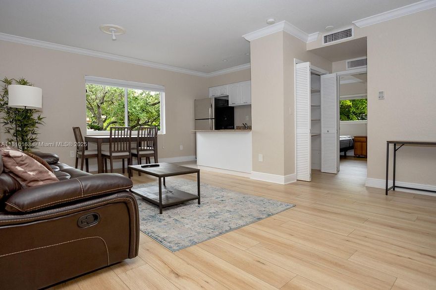 Welcome to your serene retreat at 1 Edgewater Dr. This furnished 1-bedroom rental offers a spacious layout bathed in natural light. Nestled in a charming boutique building, you'll enjoy peace and quiet on a lovely street at the crossroads of Grove and Gables. The unit features modern updates, making it a cozy and stylish home. Perfect for those seeking tranquility and convenience in a vibrant neighborhood.