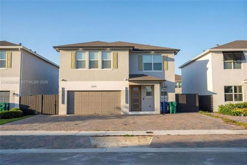 Photo of 12972 SW 265th Ter, Homestead, FL 33032 (MLS # A12002443)