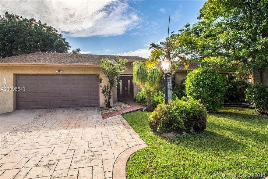 4/2 + garage in sought after area.  Split floor plan w/ vaulted ceilings & a spacious family room.  Saltillo tile thru living areas & laminate flooring in bedrooms.  Granite counters & s/s appliances.  Front loading washer/dryer + an extra bonus full sized fridge.  Oversized jetted tub, screened in porch & plenty of room in the yard for the kids/pets to play.  Freshly painted.  Walking distance to Calusa Elementary.  Near markets, movie theater, highways, restaurants & shopping.  Pets OK.  NO Association!