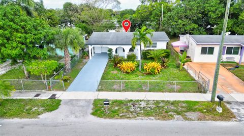 Photo of 1035 NW 11th Ct, Fort Lauderdale, FL 33311 (MLS # A11924756)