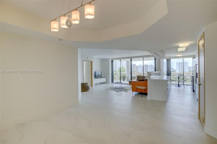 MODERN LUXURY LIVING IN THE HEART OF AVENTURA WATERWAYS! EXPERIENCE SOPHISTICATION IN THIS METICULOUSLY UPDATED 3 BEDROOM/2BATH CORNER UNIT AT THE PRESTIGIOUS HARBOR TOWERS. BOASTING 1,820 SQ FT OF SUN-DRENCHED LIVING SPACE. THIS CONDO FEATURES FLOOR TO CEILING WINDOWS, HIGH QUALITY STONE FLOORS, & 2 PRIVATE BALCONIES OF WHICH ONE IS A HUGE TERRACE LIKE SPACE, BOTH WITH STUNNING VIEWS OF THE MARINA. THE OPEN KITCHEN FEATURES QUARTZ COUNTER TOPS & PREMIUM STAINLESS STEEL APPLIANCES. THE PRIMARY SUITE OFFERS A PEACEFUL SUITE WITH REAL WOOD, CLAD SOUNDPROOF WALLS, & A SPA-LIKE ENSUITE BATHROOM WITH A DUAL VANITY. TOP AMENITIES & 24HR SECURED GUARD GATED ENTRY & VALET. RESORT STYLE LANAI POOL & JACUZZI. DEEDED PARKING SPACE IN GARAGE & EXTRA STORAGE. UNBEATABLE LOCATION, MINUTES TO SHOPPING, RESTAURANTS, BEST SCHOOLS, WHOLE FOODS, TARGET, BEST BUY, AVENTURA MALL, GULFSTREAM RACETRACK & CASINO. 
DON'T MISS THIS OPPORTUNITY TO LIVE IN ONE OF AVENTURA'S MOST DESIRABLE BUILDINGS! THE ONLY AVAILABLE SOUTHWEST CORNER UNIT IN THE BUILDING.
BEAUTIFUL BUILDING, LOBBY w/ SECURITY, CONCIERGE + VALET. FULL-SERVICE BUILDING w/ UPGRADED GYM, BBQ GRILLS, LOUNGE, POOLS, JACUZZIS, SAUNAS, BASKETBALL, PICKLE BALL + TENNIS. GREAT FOR INVESTORS - CAN BE LEASED RIGHT AWAY!