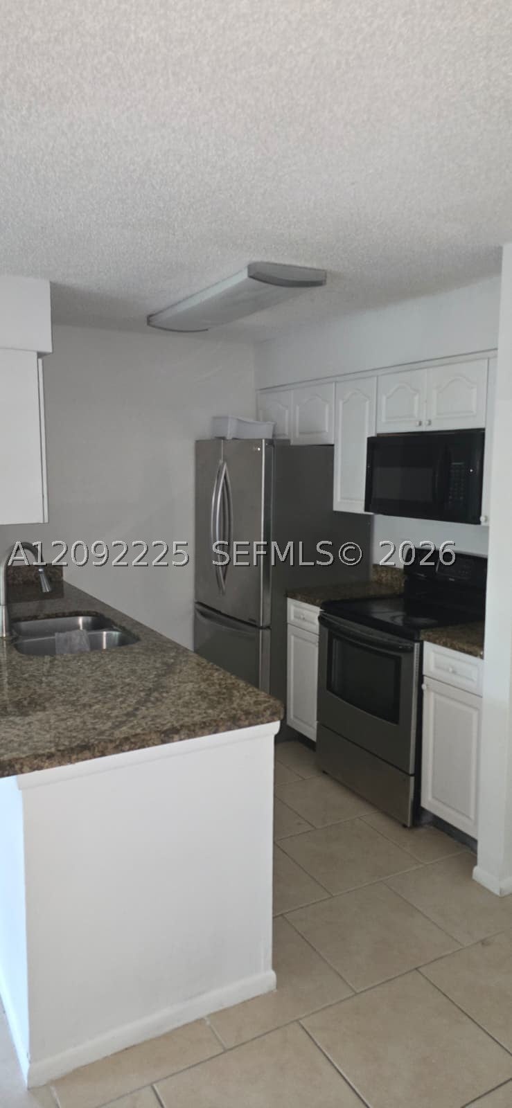 Photo of 746 NW 103rd Ter #204, Pembroke Pines, FL 33026 (MLS # A12092225)