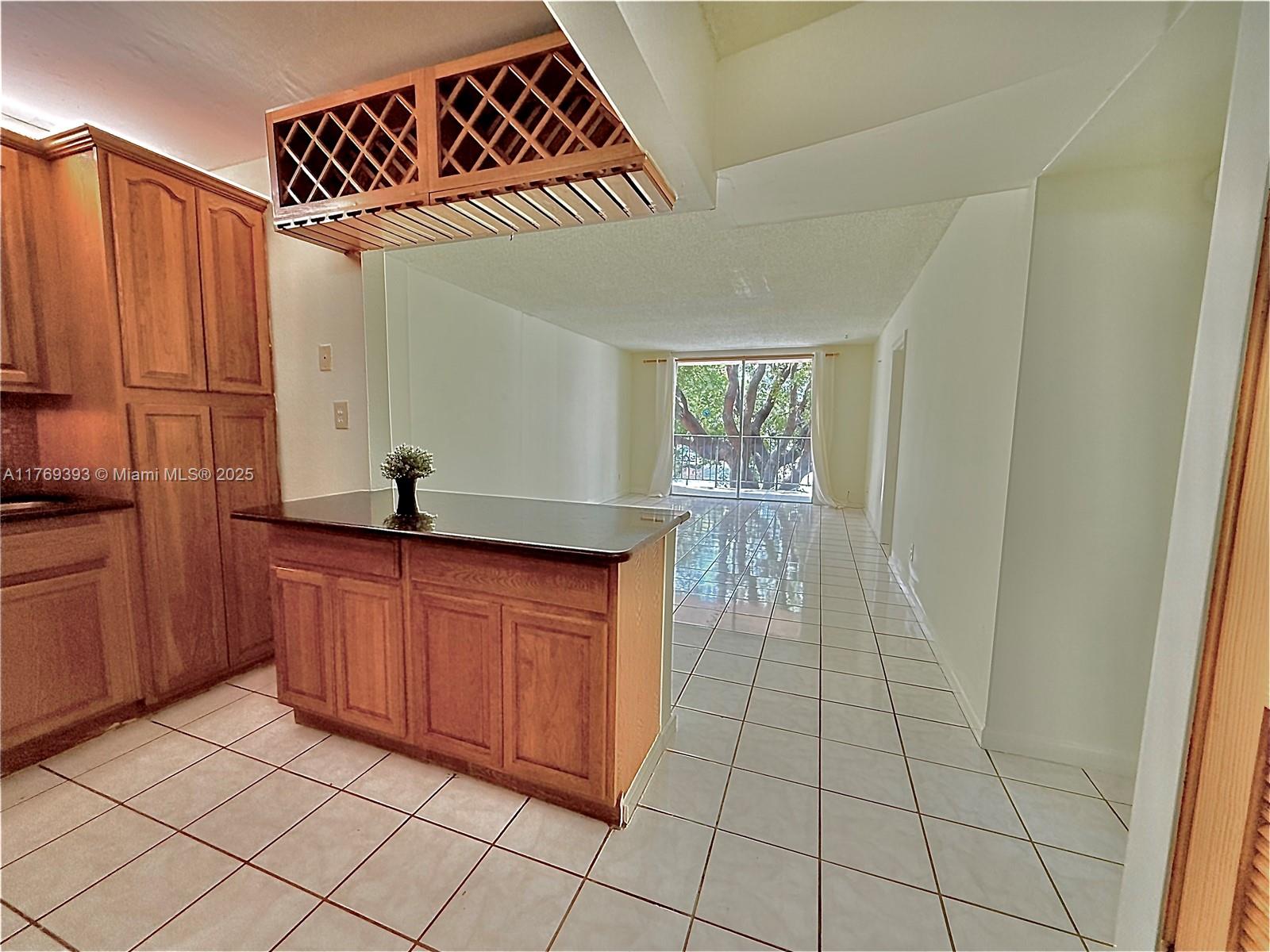 This beautiful and comfortable corner unit on the second floor features a great layout with an additional room that can serve as a guest bedroom or office. It boasts tile floors, fresh paint, an open kitchen with plenty of storage, and a new stainless steel refrigerator. The bathroom includes a shower, a window, and a fresh, clean feel. The unit is conveniently located near the building exit for easy access and comes with one assigned parking space. Water is included in the rent. You’ll love the location—just minutes from I-95 and Biscayne Blvd, with Whole Foods, LA Fitness, shops, restaurants, and parks all within minutes. Plus, it’s a quick drive to the beach, shopping centers, and entertainment.
Great apartment in a great location—schedule a showing today!