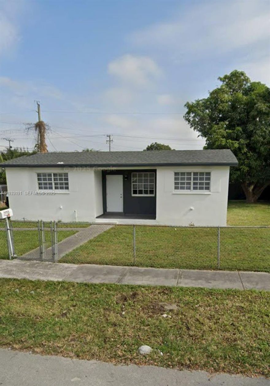 This property features a 3 bedroom, 1 bathroom main residence along with a detached legal structure in the rear offering 1 bedroom and 1 bathroom. The home has been fully updated, including a new roof installed in 2022, new flooring, renovated kitchen and bathrooms, new doors, and additional upgrades throughout. The kitchen includes quartz countertops, a spacious island, mosaic backsplash, and new stainless steel appliances to be installed prior to closing. The bathrooms are beautifully updated with porcelain tile finishes. This property presents an excellent opportunity for investors or owner-occupants seeking rental income or flexible living arrangements, as well as for large families.