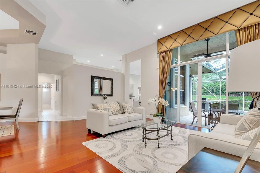 This spectacular residence located in the highly sought-after Ridges neighborhood, featuring an open floor plan and privacy with no rear neighbors—backing up to a landscaped berm. The home boasts a new roof (2021), high ceilings. Remodeled kitchen (2019) with granite countertops and stainless steel appliances.The home has two newer A/C units (2018) controlled by nest thermostats. Screened-in patio and pool (pool pump 2023), complete accordion shutters (2020). Community amenities include a swimming pool, pickleball and basketball courts, sand volleyball fields, and a children's playground.Perfectly located with convenient access to top-rated A+ schools. The elementary school bus stop is right in front of the house, and both the middle and high schools are within walking or biking distance.