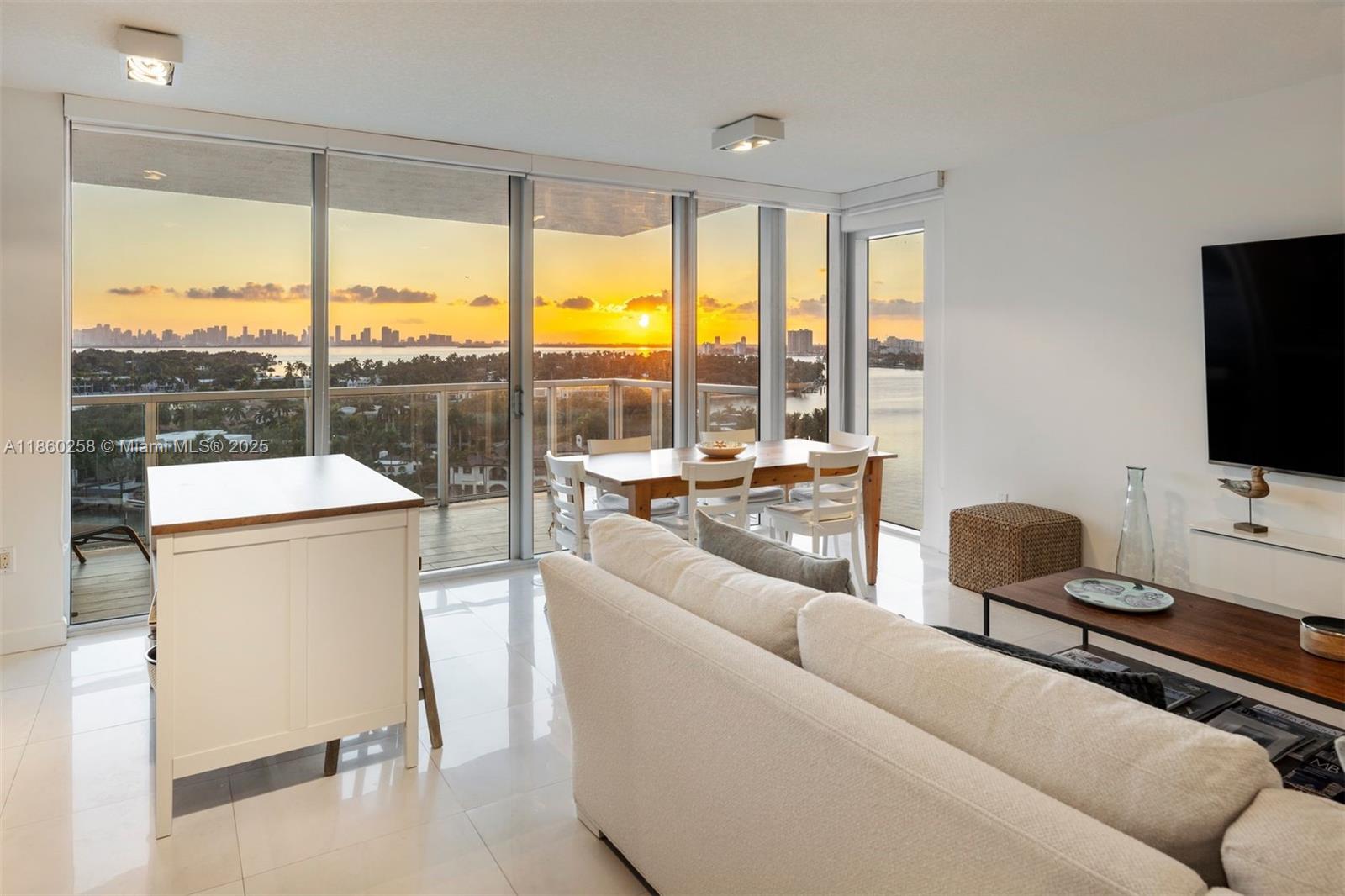 One of Miami Beach’s best-kept secrets! Experience breathtaking water, sunset, and skyline views from this stunning condo within Eden House, a luxury boutique building steps from the beach. Residence 1207 is highly sought after for its bright, modern design and expansive views. It includes two spacious balconies with access from each bedroom, an open-concept layout, and floor-to-ceiling windows overlooking Biscayne Bay and the mansions on Allison Island. The views from this residence are mesmerizing and must be experienced. Eden House is a full-service building with waterfront cabanas, a state-of-the-art gym, a sauna, a jacuzzi, and a heated pool. Eden House is centrally located to world-class dining, shopping, and entertainment just minutes away in Bal Harbour, South Beach, and beyond.