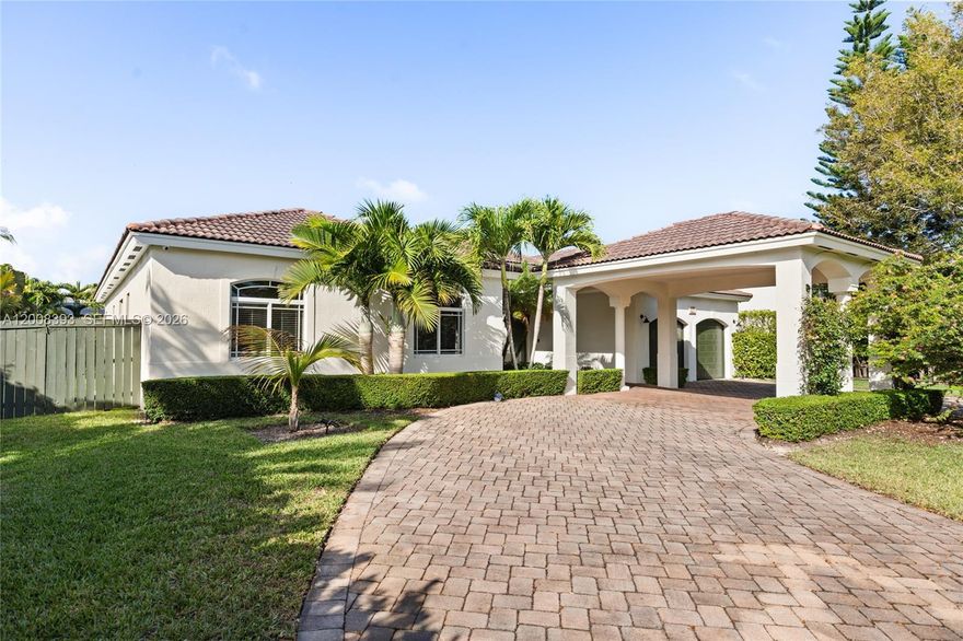 Welcome to this beautifully updated one-story home offering 4 bedrooms and 3.5 bathrooms, designed for both comfort and modern living. Located on a quiet cul-de-sac street, this home offers both privacy and a peaceful setting. From the moment you enter, you’ll notice the bright, open layout with high ceilings and abundant natural light, seamlessly connecting the living, dining, and family areas with a stylish chef’s kitchen—perfect for everyday living and easy entertaining.

The spacious primary suite features a custom walk-in closet and a well-appointed bathroom with dual sinks, soaking tub, and separate shower. The home also offers a large laundry room with stainless steel sink, cabinetry, and LG washer and dryer. Additional highlights include a new A/C system installed in 2024, plus smart home features such as WiFi-controlled A/C, security camera system, and two new garage door motors with remote access and high impact windows and doors. 

Step outside and enjoy your own private backyard retreat featuring a covered terrace, summer kitchen, and pool—ideal for relaxing or hosting family and friends year-round. The home also offers lush landscaping with native trees and an irrigation system.

Ideally located near Deering Estate for walking or biking, and just minutes from Palmer Trinity School and other top-rated schools, this move-in ready home offers a great balance of style, comfort, and convenience.