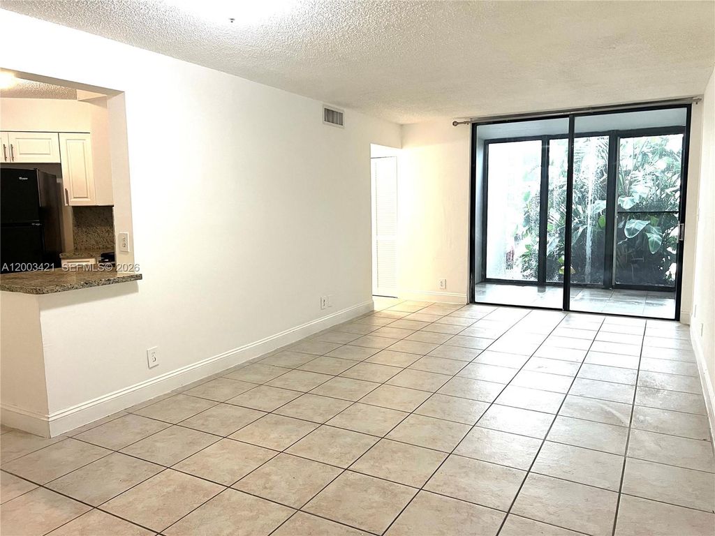 Photo of 210 Lake Pointe Dr #112, Oakland Park, FL 33309 (MLS # A12003421)