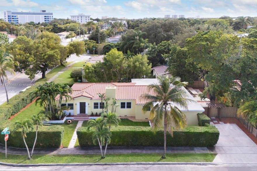 This spacious residence offers over 2,750 sqft & blends timeless charm with modern upgrades. Sitting on a nearly 10,000 sqft corner lot, the home features 3 beds plus a den/office, a completely renovated master wing with expansive custom closets & a luxurious steam shower Original details like the fireplace & wood floors preserve its character. Major improvements include trenchless plumbing sleeving, Impact windows & doors, new AC ducts, new appliances, & roof improvements in 2019. The property is surrounded by mature hedges offering both privacy & security. Located in The Roads neighborhood, just steps from Brickell & minutes from Coconut Grove & Coral Gables. Restaurants & shops along Coral Way & in Little Havana are easily accessible via the beautiful linear walking park along 13th Ave.