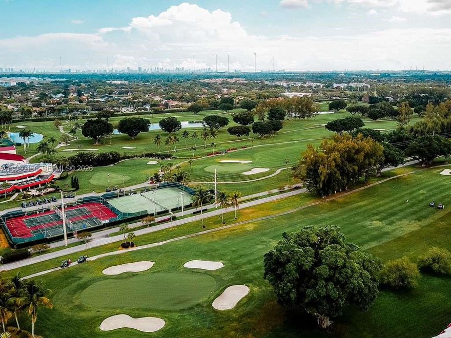 Wow…Golfer’s Dream & Unbeatable Value at Hollybrook Golf & Tennis Club! Rare 2,100 Sq Ft Double-Unit on the 18th Hole! Incredible 55+ resort living with this rare, masterfully combined 3BR/2.5BA double unit. Completely redesigned, this spectacular condo boasts over 2,100 sq ft of sophisticated living space with breathtaking, panoramic views. Savor tranquil Florida mornings and watch the golfers from not one, but two private patios. The expansive, open-concept layout is an entertainer’s delight, featuring a pristine white kitchen, custom built-in cabinetry, a dedicated wet bar, and integrated surround sound, washer and dryer inside the unit, impact windows. Every premium detail has been considered, including custom California closets, a private in-unit laundry room, two newer A/C units, and two parking spaces. Priced exceptionally well for a quick sale furnished!  Ideally situated near premium shopping, dining, and entertainment. Don't miss your chance to live in paradise!