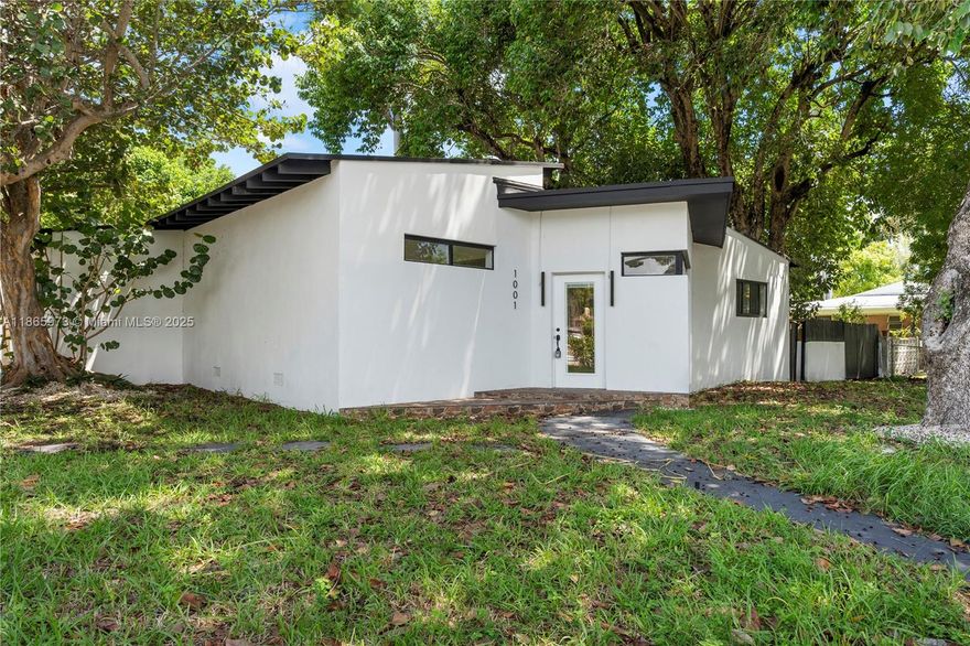 Welcome to 1001 NE 82nd St, a beautifully renovated 5 bed / 5 bath home with 2,754 sq ft of living space on an oversized 11,250 sq ft lot. Featuring a brand-new kitchen with premium appliances, modern flooring, and a freshly landscaped backyard, this residence blends luxury with family comfort. Located east of Biscayne Blvd, just minutes from Miami Beach, Midtown, Wynwood, and Brickell, you’ll enjoy quick access to top schools, parks, shopping, and dining. The spacious layout, private driveway, and garage make this the perfect home for families seeking elegance, convenience, and Miami lifestyle.