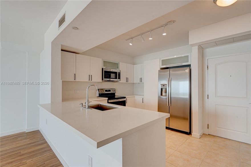 Toscano Dadeland 2/2 Rental – Enjoy unobstructed views from the spacious 15th-floor balcony of this beautifully updated 2-bedroom, 2-bath residence in the prestigious Toscano Condominium, ideally located directly across from Dadeland Mall.  This move-in-ready unit features a desirable split floor plan with LVT wood flooring throughout, a brand-new kitchen, new appliances, modern window treatments, generous closet space, and tastefully updated bathrooms. Large laundry room with side-by-side washer/dryer and shelving.  The unit includes assigned parking plus valet service, cable and internet, as well as a 5x5 air-conditioned storage unit. Toscano offers resort-style amenities including a serene courtyard, heated pool and spa, fitness center, elegant lobby, and complimentary valet. Vacant and easy to show. Text listing agent for access.