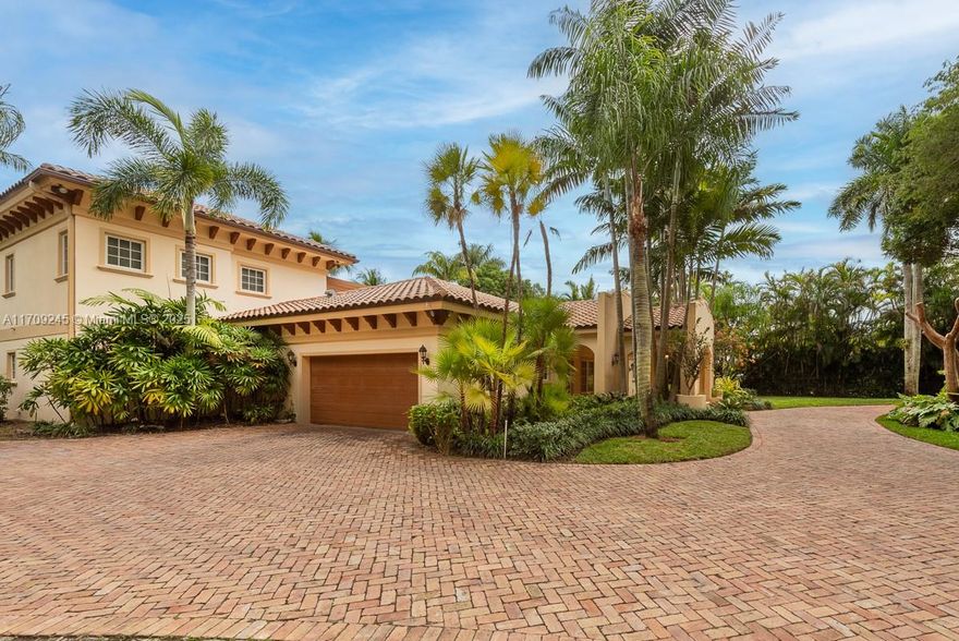 Mediterranean revival in sought after North Pinecrest! Remodeled in 2020, 2-story home on a corner, 32,377 SF lot with private amenities, professionally lit tennis court, saltwater pool, Tiki Hut in your backyard oasis. This 4,030-SF home, teak and marble floors, custom staircase, chef’s kitchen with Viking appliances, quartz counters and pre-wired dining/family room. Master suite features dual custom closets & dual sinks, clawfoot tub, & travertine finishes. Upstairs, 2 suites with walk-in closets, granite & tile accented baths. Cabana suite on main floor with marble floors, built-in closets, & bath with onyx finishes. Hurricane-rated doors & windows, security system, underground FPL lines. A blend of elegance & modern living, offering unmatched lifestyle in prime location.