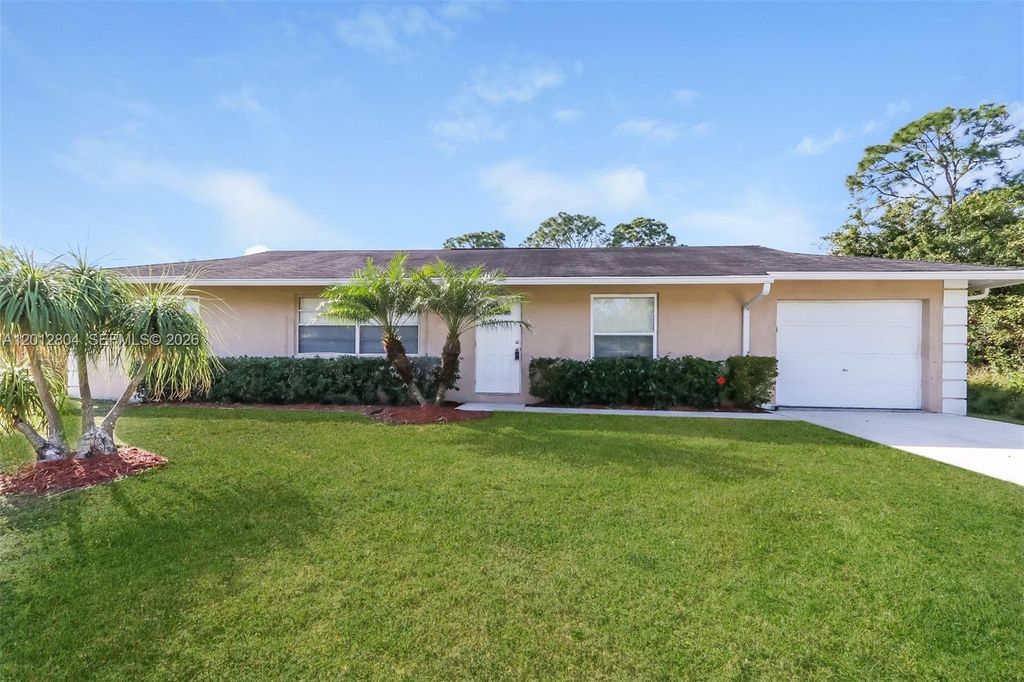 Photo of 650 NW Selvitz Rd, Port St Lucie, FL 34983 (MLS # A12012804)