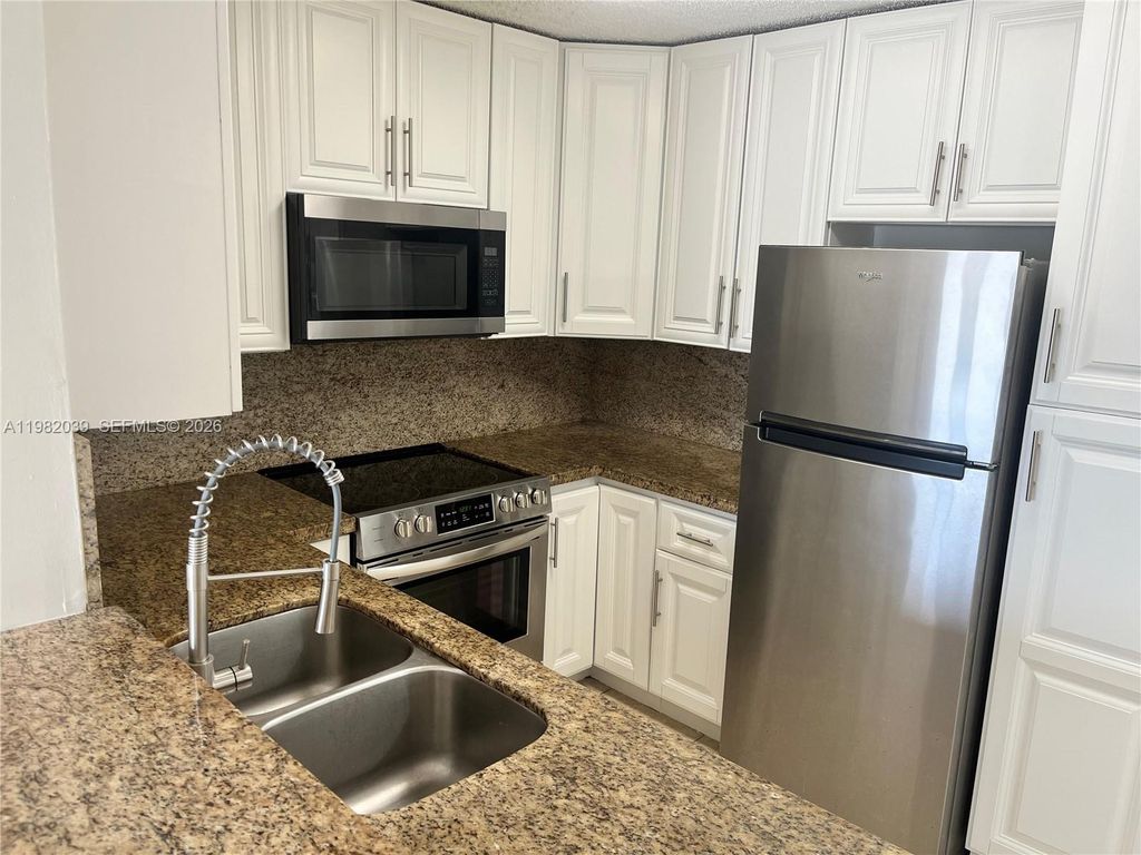 Photo of 200 W Palm Cir W #107, Pembroke Pines, FL 33025 (MLS # A11982039)