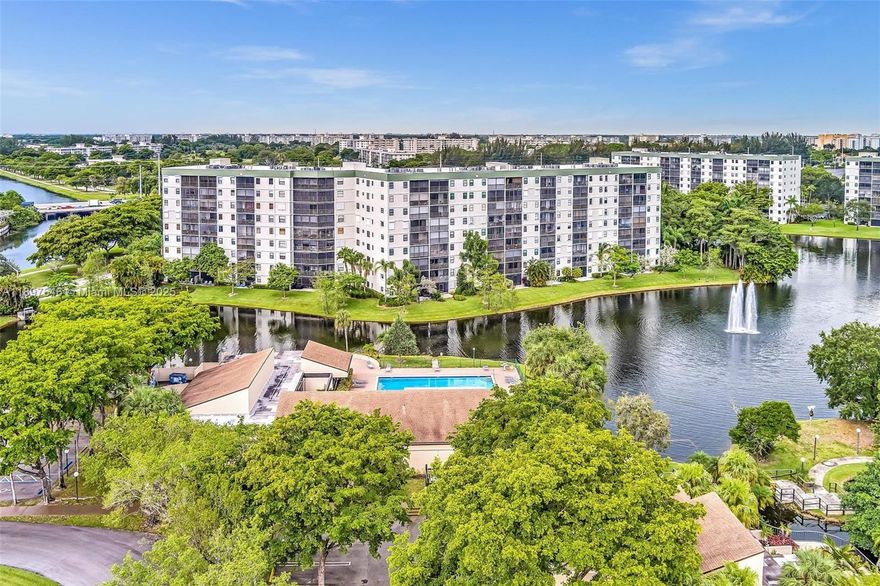 STEP INTO THIS EXQUISITE MODERN SPACE. TASTEFULLY RENOVATED 2 BEDROOM 2 FULL BATHS OVERLOOKING THE WATER. THIS SPACIOUS 2 BEDROOM OPEN FLOOR PLAN UNIT FEATURES QUARTZ COUNTERTOPS WITH TOP OF THE LINE KITCHEN AID STAINLESS STEEL APPLIANCES, BRAND NEW SAMSUNG WASHER DRYER, GLASS TILE BACKSPLASH, MODERN WOOD CABINETRY, BUILT IN WINE COOL, RHEEM AC 2018 UNIT WITH NEST TEMP CONTROL, RHEEM HOT WATER HEATER, IMPACT WINDOWS, PATIO STORM SHUTTERS.  MASTER BEDROOM COMES WITH KING SIZE BED SET WITH ENSUITE BATH THAT FEATURES STATE OF THE ART TOILET WITH BIDET, HEATED SEAT AND DRYER. GUEST BEDROOM COMES WITH QUEEN SIZE BED SET.  THIS SPECTACULAR UNIT COMES FULLY FURNISHED.  NOTHING HAS BEEN SPARED.  TURNKEY INVESTMENT, MOVE IN READY ! NO OTHER UNIT LIKE IT.  REQUEST A SHOWING TODAY !