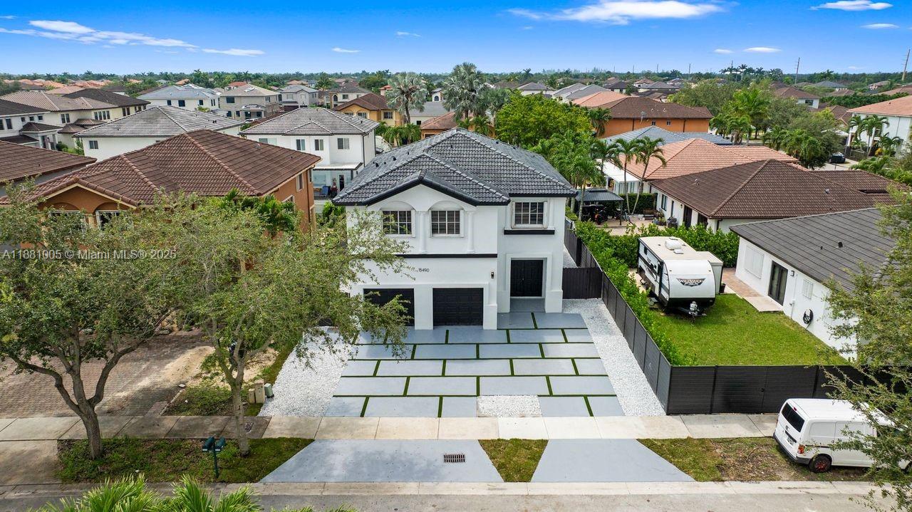 "STUNNING AND PICTURESQUE" are the only words to describe this beautiful 5 bedroom / 4 1/2-bathroom home located in the much desired and amazing neighborhood in West Kendall. This contemporary style home features gorgeous floors throughout the entire home, a brand-new pool, a large spacious kitchen with brand-new stainless-steel appliances, modern style bathrooms and so much more. This prestige property has high spacious ceilings and a backyard and pool that is second to none. This home is "Move-In-Ready" to use to entertain family and friends throughout the year. No HOA.