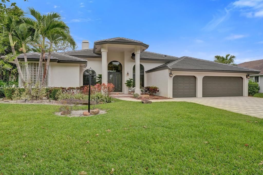 Photo of 9724 NW 66th Pl, Parkland, FL 33076 (MLS # A12001825)