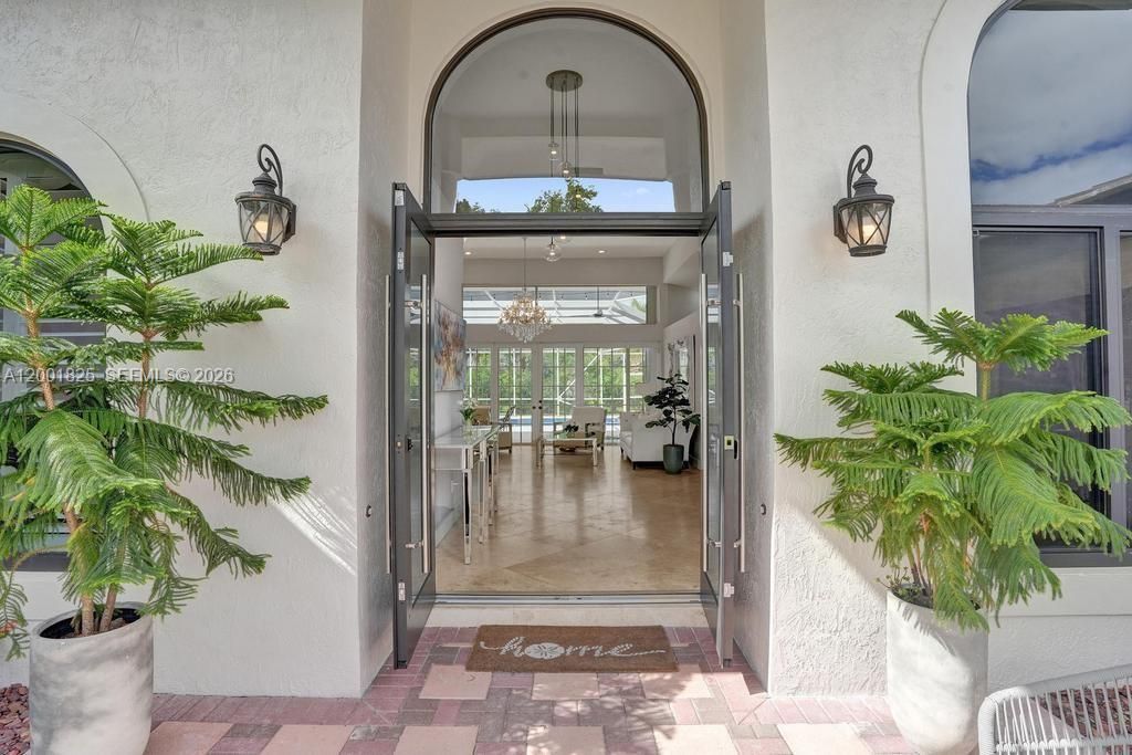 Photo of 9724 NW 66th Pl, Parkland, FL 33076 (MLS # A12001825)