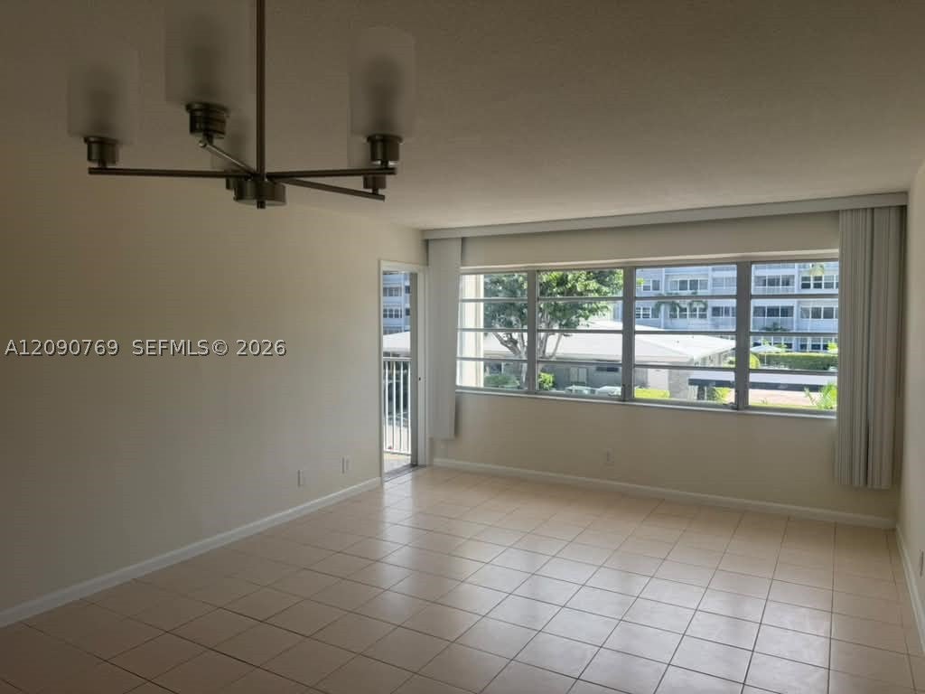 Photo of 330 SE 2nd St #202E, Hallandale Beach, FL 33009 (MLS # A12090769)