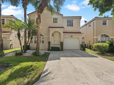 Photo of 417 NW 87th Ln, Coral Springs, FL 33071 (MLS # A11887442)