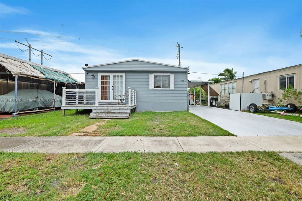 Photo of 700 NW 219th Ave, Pembroke Pines, FL 33029 (MLS # A11905010)