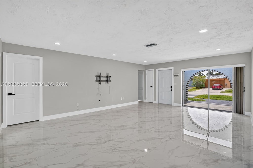 Photo of 9531 NW 20th Pl, Sunrise, FL 33322 (MLS # A12062827)
