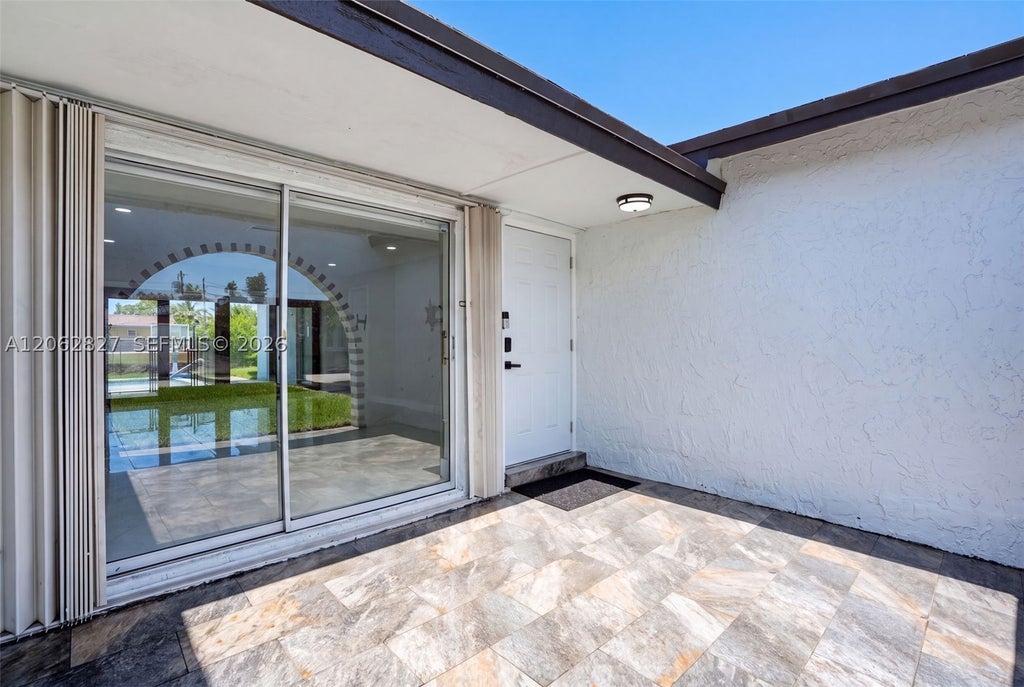 Photo of 9531 NW 20th Pl, Sunrise, FL 33322 (MLS # A12062827)