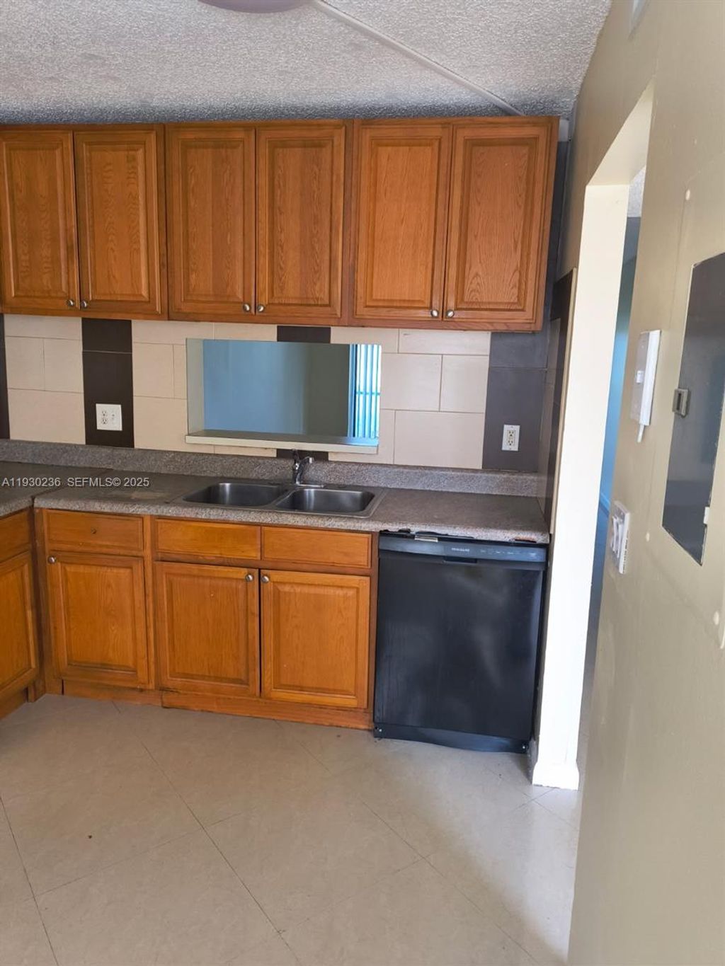 Photo of 7941 Southgate Blvd #A3, North Lauderdale, FL 33068 (MLS # A11930236)