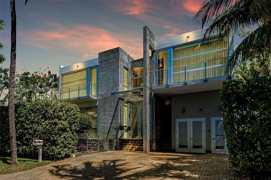 Striking contemporary design and solidly built concrete construction from top to bottom, unlike any other property. This magnificent fortress features floor-to-ceiling high impact windows that illuminate this home with natural light throughout. This almost 4,000 sf, 2-story suits anyone's needs complete with 5Bd/4.5Bth +maid's quarters. Marble and wood flooring in all areas, a chef's Mia Cuccina kitchen, German bathroom fixtures and accessories, interior/exterior garden patio + balconies w/all bedrooms highlight this extraordinary residence. The covered terrace/barbecue area overlooks the inviting pool and waterfall/hot tub. An exquisite home in the tropical island paradise, Key Biscayne!