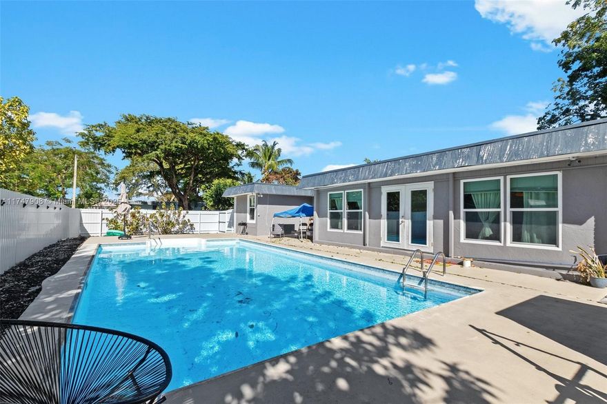 Appraised at $520,000, this corner-lot home offers over 2,200 sq. ft. of living space, featuring 3 bedrooms, 2 baths, 2 bonus rooms. Recent upgrades include impact windows and doors, vinyl flooring, fresh paint, and new appliances. The fenced backyard is perfect for entertaining, complete with a beautiful pool. Pink pool table and piano are also for sale!