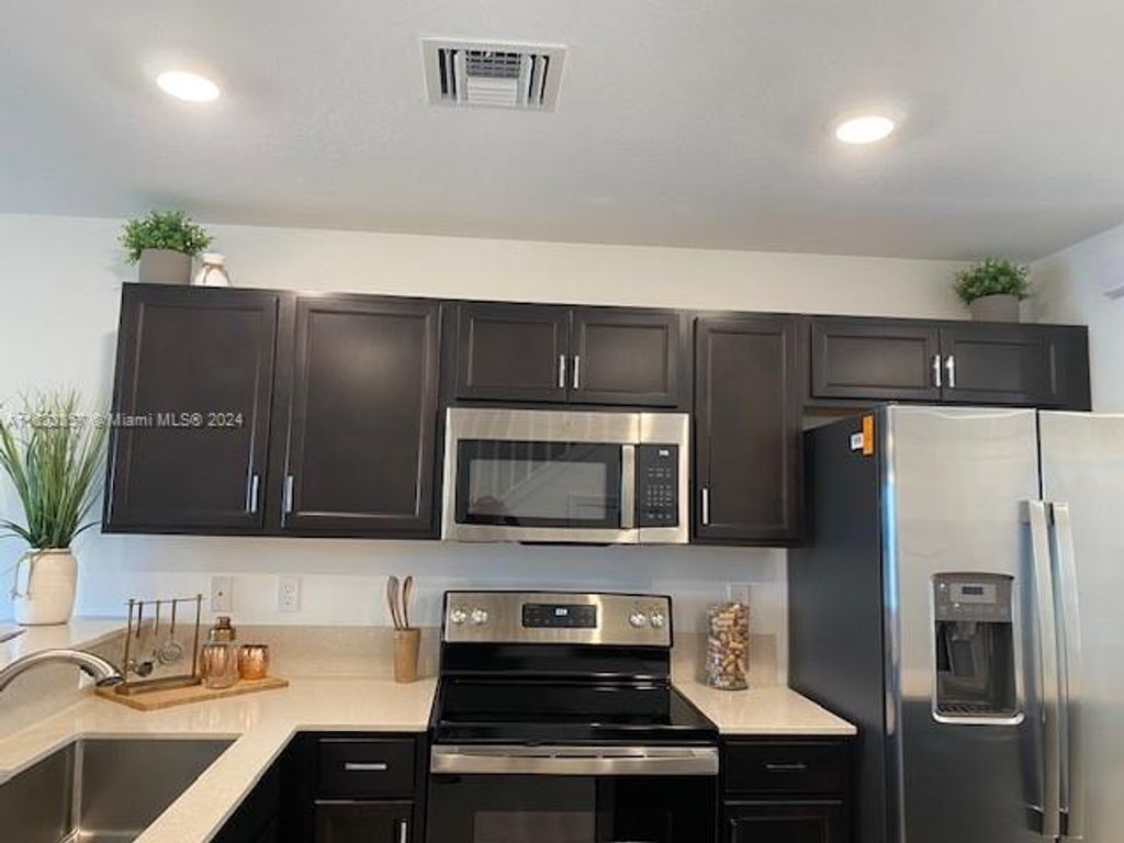 Photo of 5042 Genove Pl, Palm Beach Gardens, FL 33410 (MLS # A11623357)