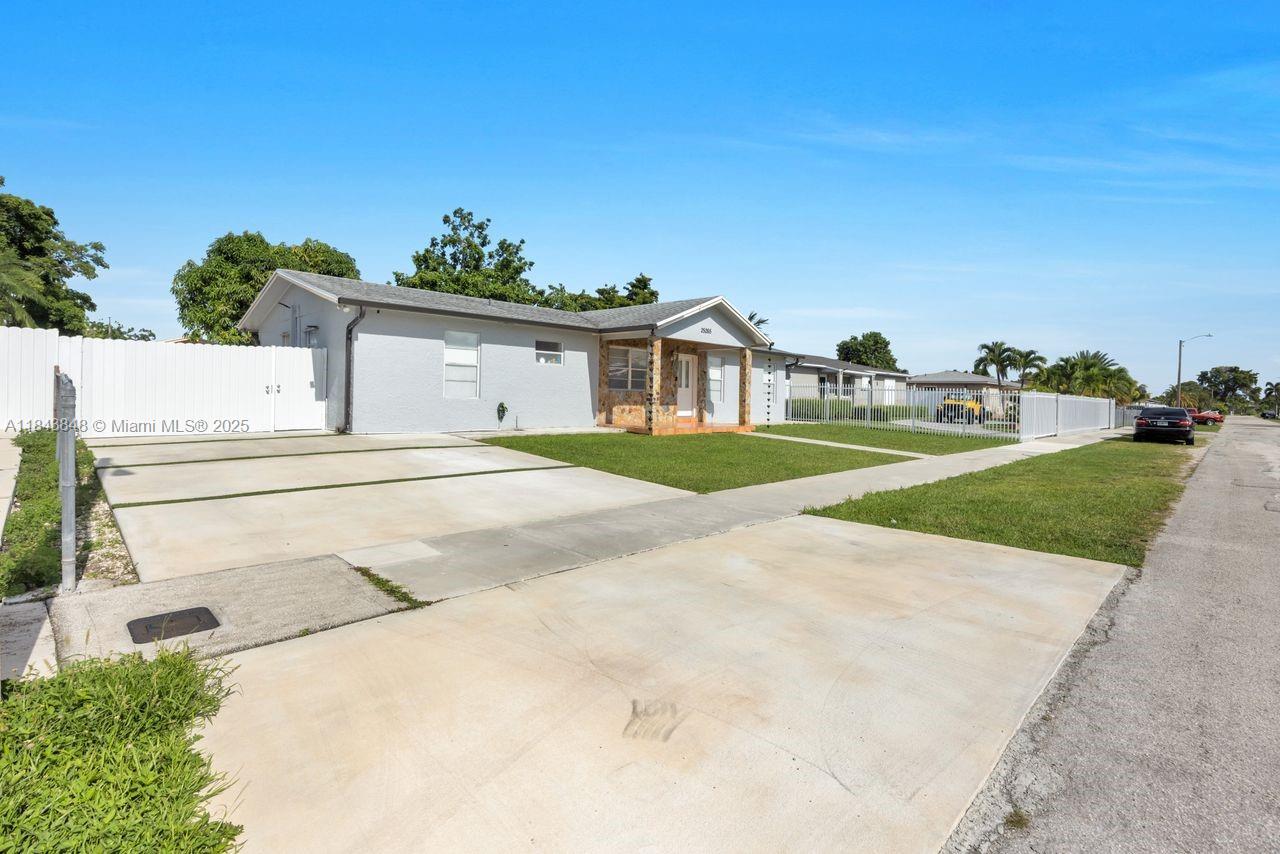 Welcome to 25265 SW 124th Pl a beautifully updated 3-bedroom, 2 bath home offering 1,560 sq ft of inviting living space. The newly renovated kitchen features modern finishes, sleek cabinetry, and ample prep space, perfect for home chefs. A new water heater adds convenience and peace of mind.
Enjoy an open concept layout that flows seamlessly into a spacious backyard, where a custom outdoor kitchen awaits. Ideal for entertaining or relaxing, the fenced yard offers privacy and comfort.
Located in a quiet neighborhood with no HOA, this home provides easy access to major highways, schools, shopping, and dining. Move in ready and full of charm don’t miss your chance to call this Homestead gem your own.