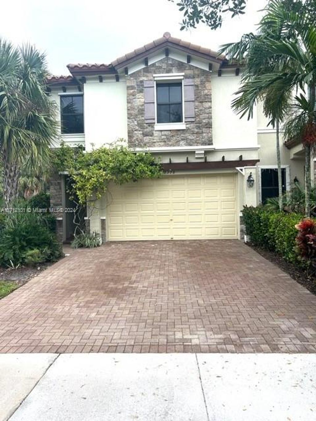 Photo of 6978 Halton Park Ln #6978, Coconut Creek, FL 33073 (MLS # A11712101)