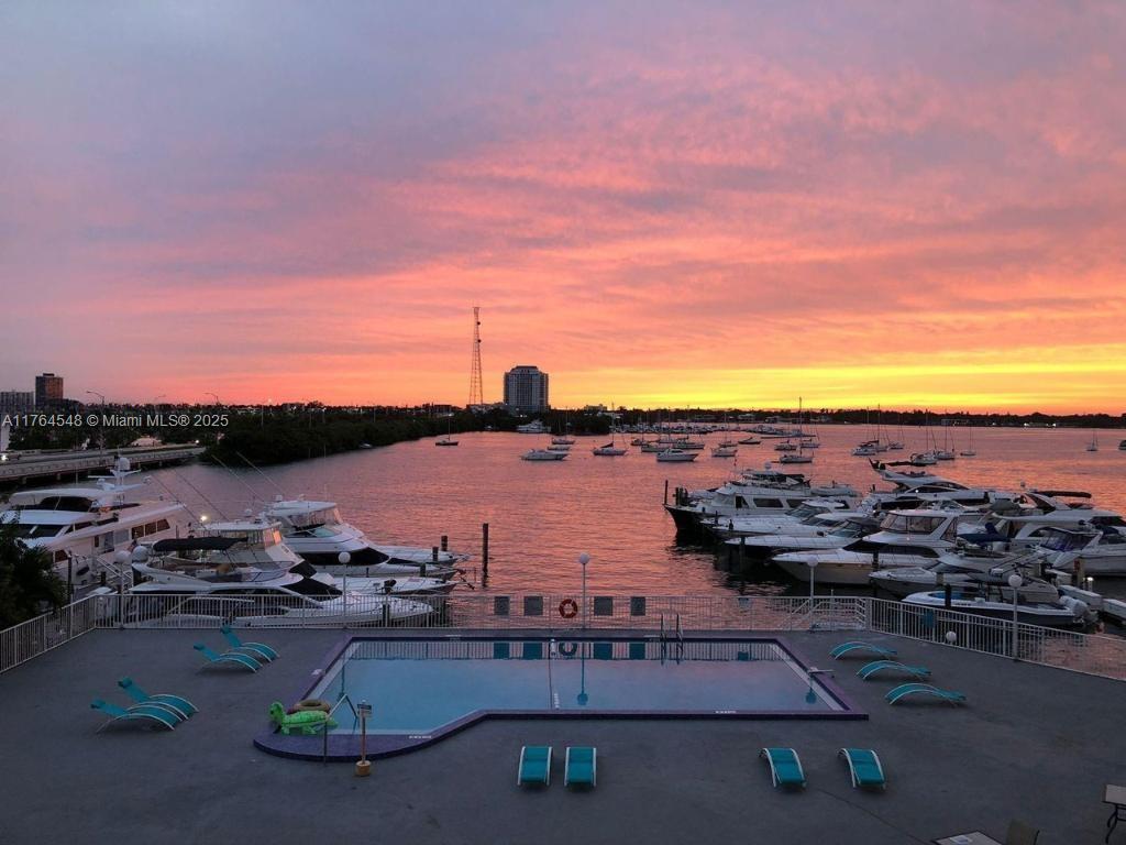 Stunning Waterfront Studio in North Bay Village! Enjoy breathtaking Biscayne Bay views from this beautifully updated 5th-floor studio at the Bayshore Yacht & Tennis Club. This turnkey investment opportunity features short-term rental flexibility with a minimum 1-month lease, making it ideal for Airbnb or seasonal rentals.
The unit offers 444 sq. ft. of open living space, a private balcony, and floor-to-ceiling windows showcasing unobstructed water views. The kitchen features modern appliances, and the bathroom is tastefully updated. All utilities are included in the HOA, making this a hassle-free investment or a perfect waterfront retreat. The property currently has a listing on Furnished Finder, Ideal Second home or investment opportunity.
