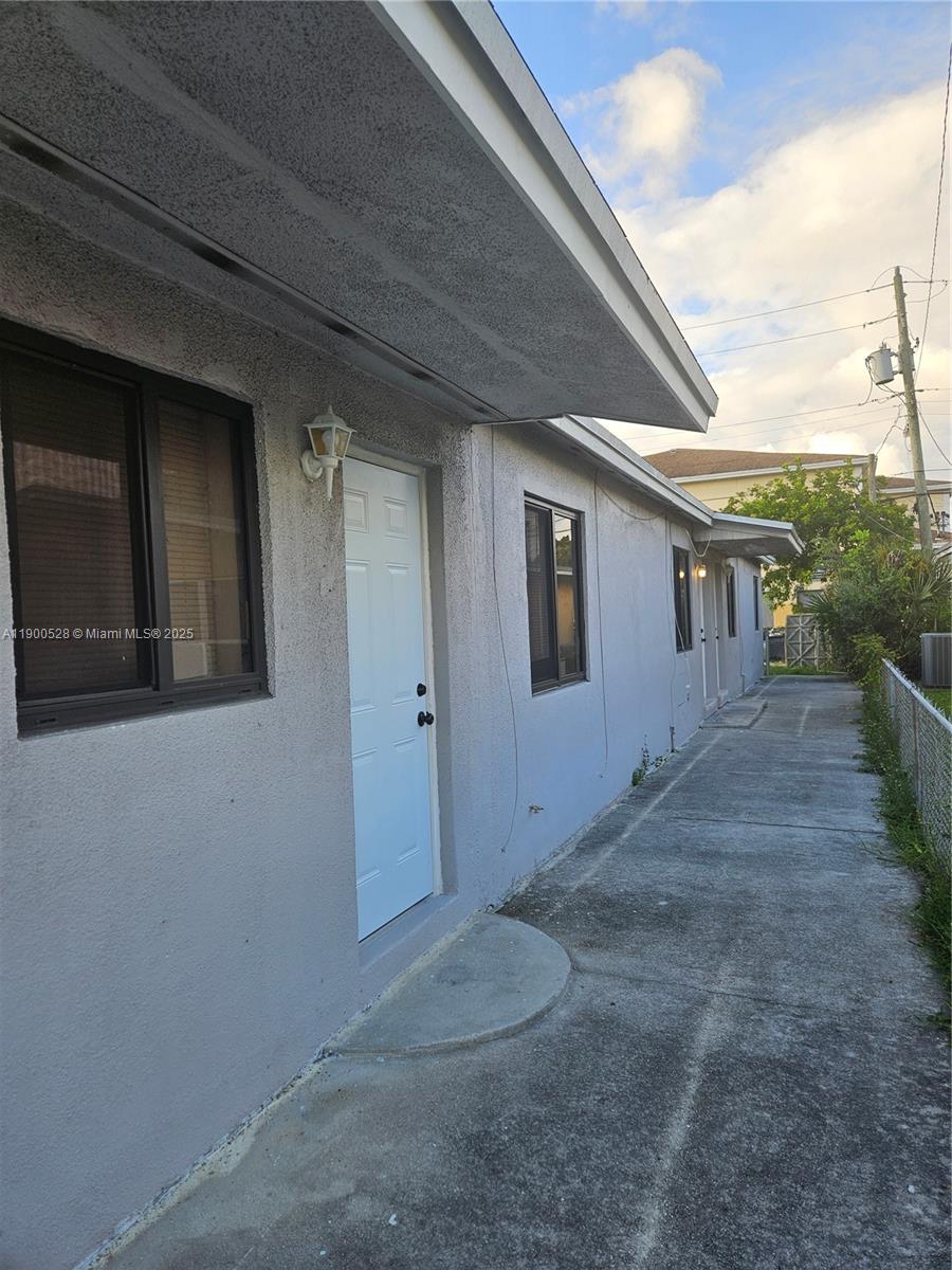 Immaculate 3Beds/ 2Baths Duplex, NO HOA! central A/C, spacious bedrooms, linen closets, new floors, stackable washer/dryer in unit. In the heart of Hollywood, near shops at Dania Point & Oakwood Plaza + to all major highways, Downtown Hollywood, Restaurants, FLL Airport and just 2 miles from beautiful beaches. Monthly rent includes water, sewer, garbage, pest control. Move-in cost (first month, last month & security deposit). clean background a MUST, credit report, no evictions report at tenants expense ($35/person), copy of IDs, proof of income for all adults over age 18 on the application. 1 Parking space available in the back and plenty of street parking. New roof 2020 and ALL new impact windows 2023, impact doors 2025. Small pets under 20 lbs allowed w/ pet deposit.