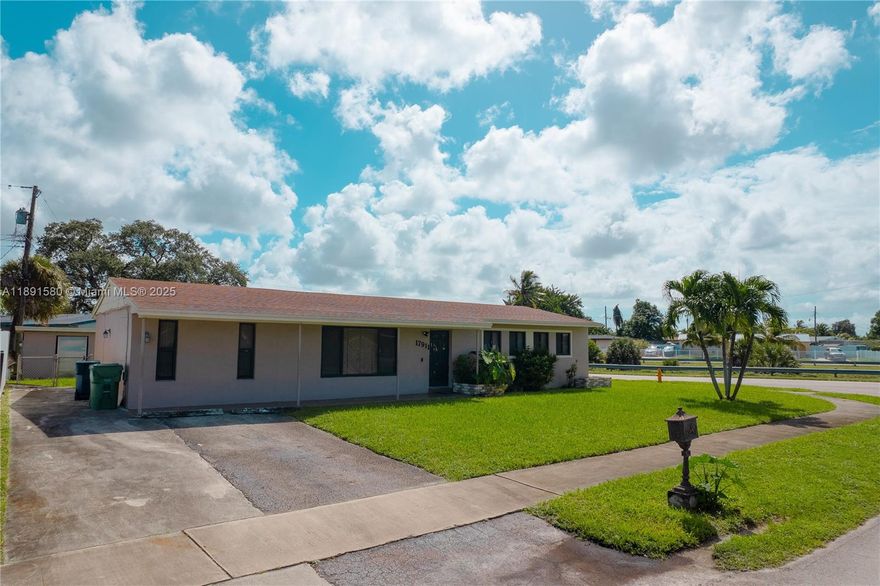 Updated single-family home located on a spacious corner lot in the heart of Miami Gardens. This 3-bedroom, 2-bathroom residence offers comfort, style, and versatility. Step inside to find gorgeous tile floors, layout that easily allows for sectioning off the home for additional efficiency or privacy—all while maintaining the full 3 bed, 2 bath configuration. The kitchen and bathrooms have been tastefully updated, featuring modern finishes. Enjoy peace of mind with all impact-resistant doors and windows, newer roof and central air conditioner—both less than five years old. Outside, the large yard offers plenty of room to relax or entertain, with a spacious concrete shed perfect for storage, or even a studio. Don’t miss this move-in ready gem in a desirable location.