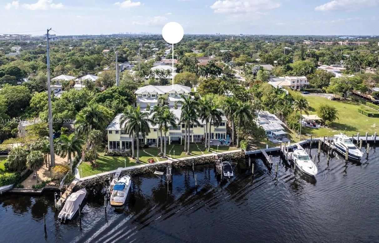 *PRIVATE GET-AWAY!! Stunning move-in ready 3bedr,2.5bath townhome within a rarely available gated community nearby Las Olas and offers the price-savvy Buyer a chef’s kitchen, designer finishes, high volume ceilings throughout, spa-like bathrooms and accordion shutters. 1-car garage & 2 car driveway!! Enjoy the open layout, spacious primary suite, & private patio w/direct access-tennis, pickleball, heated pool, and rentable dockage on New River. Located steps away from the bridge to Las Olas, Riverwalk, 5-minutes to FLL Airport & the beach. Investor-friendly—rent right away! Outstanding HOA includes flood/windstorm insurance, water/sewer, trash, roof,& landscaping. Your privately gated community amidst tranquil waterways awaits you! Live or invest with confidence! Schedule your visit today!
