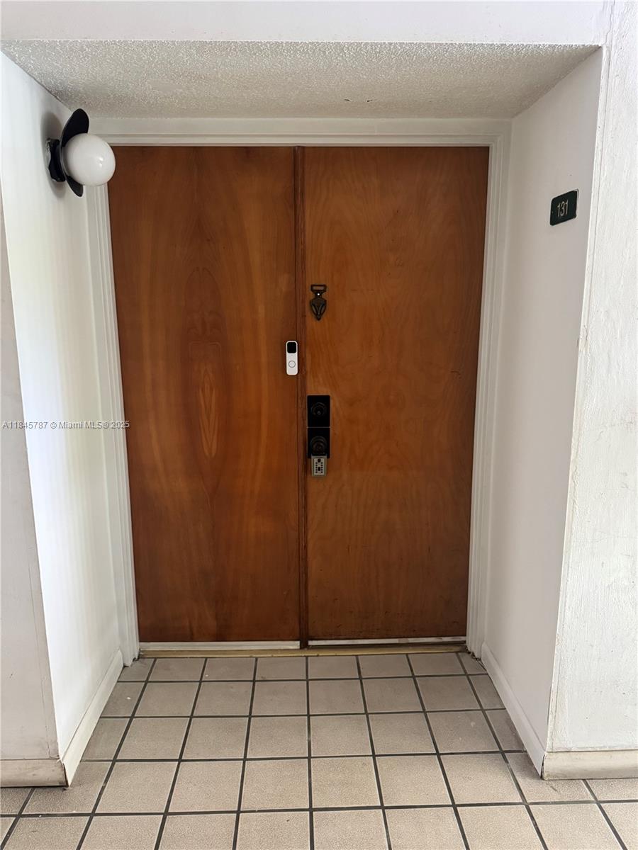 Most desirable corner unit on the first floor. Reserved parking space right outside the patio. Washer and dryer inside the unit. Freshly painted. Walk-in closet in the Master Bedroom. Community is getting renovated. Walking distance to Sedano's, bus stops, restaurants, and Navarro. Very close to FIU and Florida's Turnpike.