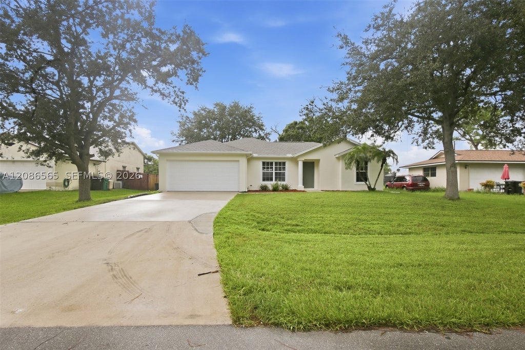 Photo of 1668 SE Nancy Ln, Port St Lucie, FL 34983 (MLS # A12086565)