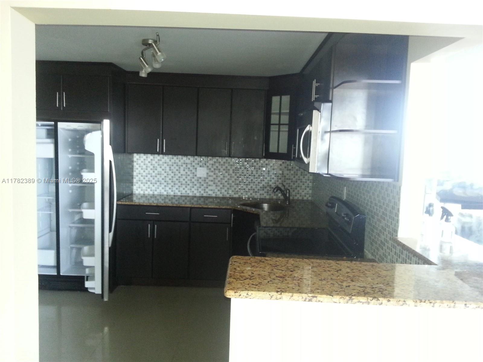 COMMODORE PLAZA CONDO - Residential