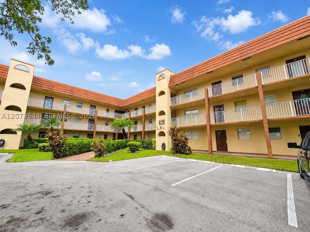 Photo of 2801 N Pine Island Rd #208, Sunrise, FL 33322 (MLS # A12073644)